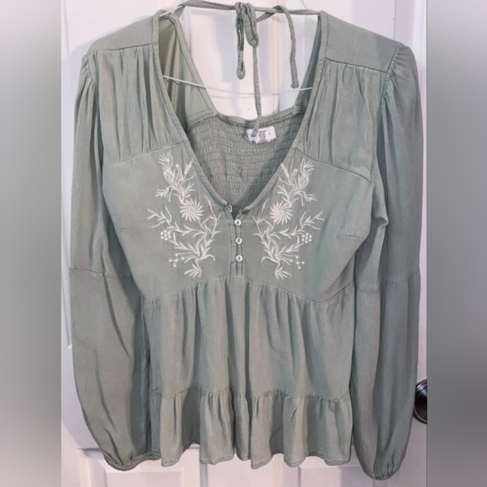 greenish blue floral blouse